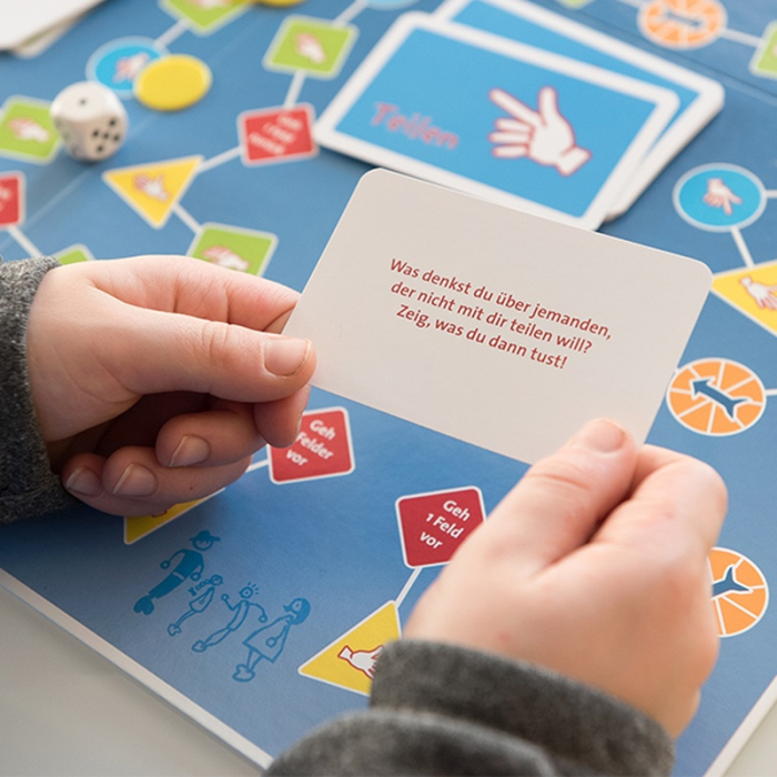 Das Helfen Sorgen Teilen Spiel